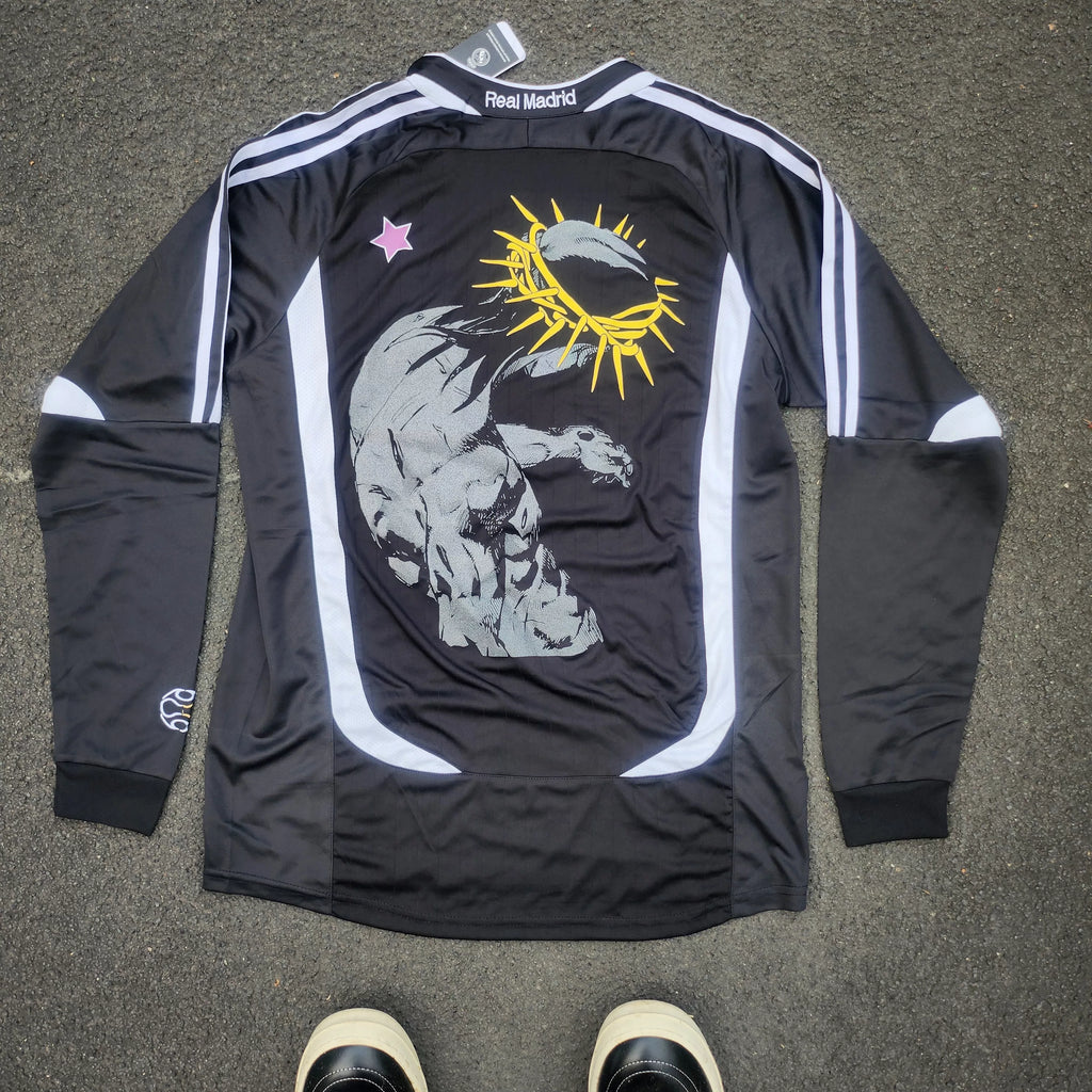 Saint Relics Real Madrid Schwarz Langarm Grafiktrikot